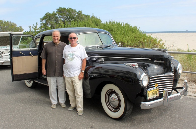 On September 18, Sea Isle City’s Promenade will be lined with classic vehicles during the Fall Family Festival Antique Auto Show. Shown with Mayor Leonard Desiderio (at left) is the 2015 Auto Show’s Best In Show trophy winner, Mike Tackas, of Pittsgrove, NJ, owner of this beautiful 1940 Chrysler New Yorker.