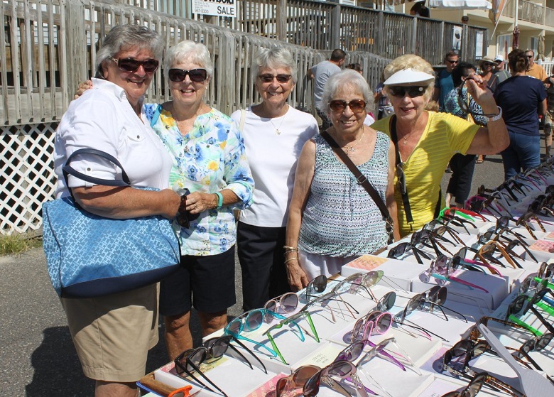  Countless shoppers discovered bargains on sunglasses and other merchandise at Fall Family Festival – including (from left) Irene Sakowski, Connie Clarke, and Barbara Yarnell, all of Swarthmore, PA; Lydia McAndrew, of Glenn Mills, PA; and Renee Reuling, of Springfield, PA and Sea Isle City.