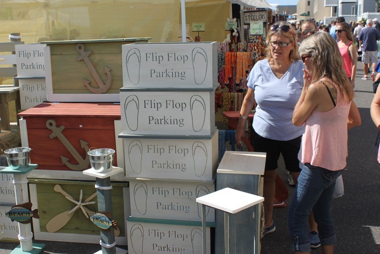 This year’s Fall Family Festival Seaside Market featured a wide variety of handmade items – including “Flip Flop Parking” crates and other unique wooden crafts. Shown during the festival are Lisa Miller, of Churchville, PA and Sea Isle City (at left), and Cindy Haldis, of Philadelphia. 