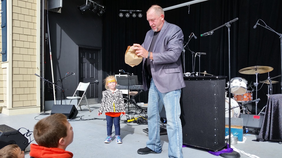 Magician Dave Cornwell, of Center Stage Entertainment, amused the children with tricks and illusions.