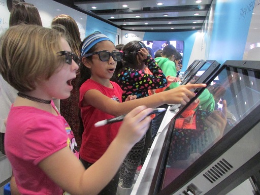 Second- and third-graders from Ocean City Primary School, including Caylee Borman and Suzy Bautista-Rodriguez, partnered-up and wore special glasses in order to interact with the zSpace bus.