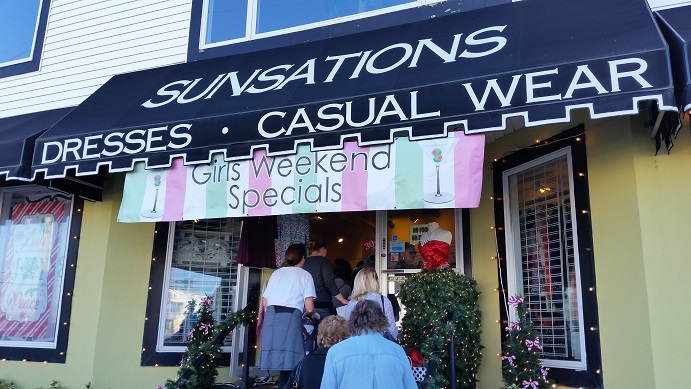 A Girls Weekend sign greets customers entering the Sunsations shop on John F. Kennedy Boulevard.