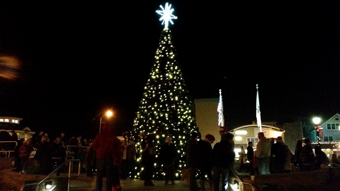 The festivities culminated with the lighting of a towering holiday tree that overlooks Excursion Park.