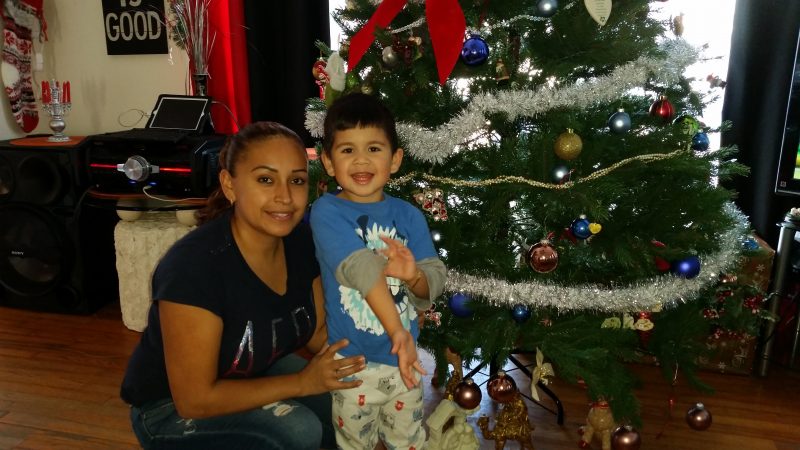 Angela Fraga and her 3-year-old son, Jose Jr., are among the local residents benefiting from the holiday drive.