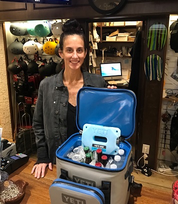 Jamie Keenan demonstrates some of the Yeti features using a customers packed cooler.