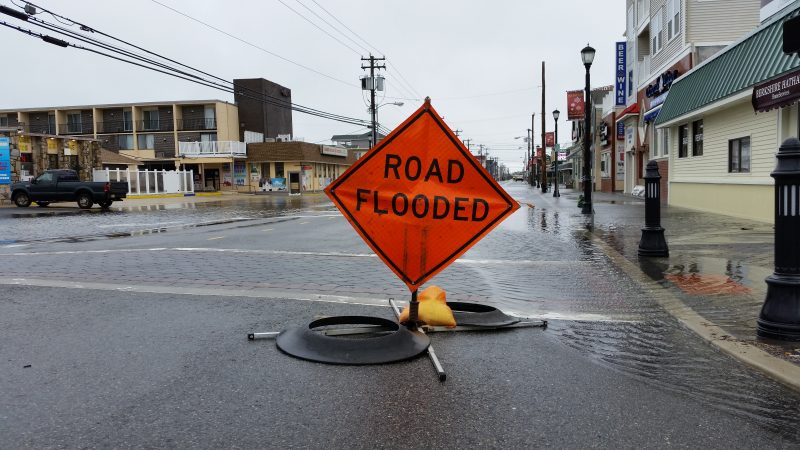 Motorists encountered "road flooded" signs while trying to drive around town.