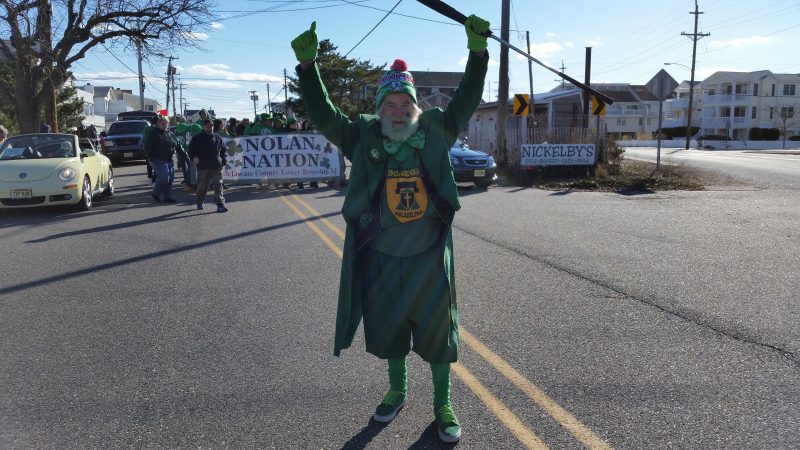 Bundled up in extra layers of green clothing, 81-year-old Pop Welsh led the parade as a leprechaun.